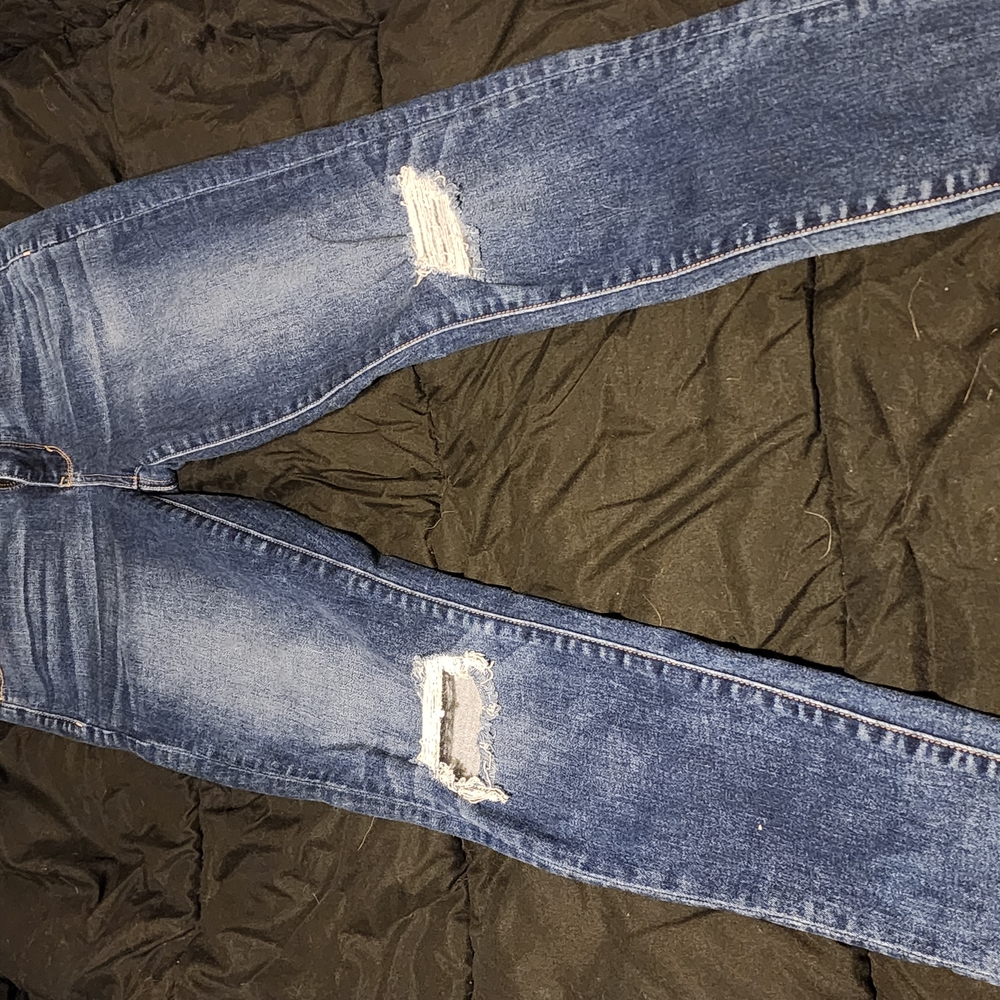 Distressed Blue Denim Jeans